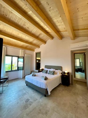Ένα ή περισσότερα κρεβάτια σε δωμάτιο στο Casa Rosa