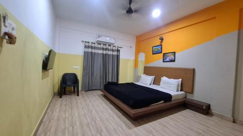 Postel nebo postele na pokoji v ubytování Bhattacharya holiday homes goa