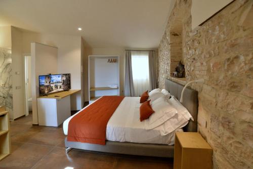 TV a/nebo společenská místnost v ubytování Rooms in Spello