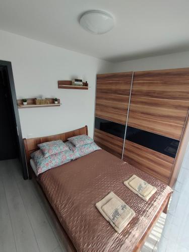 Postel nebo postele na pokoji v ubytování Borics Apartman