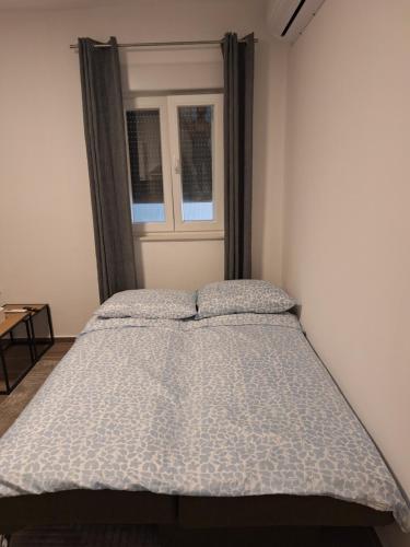 Postel nebo postele na pokoji v ubytování Apartman Damir