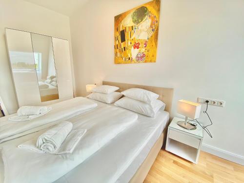 Cama o camas de una habitación en Steiner Residences Mödling