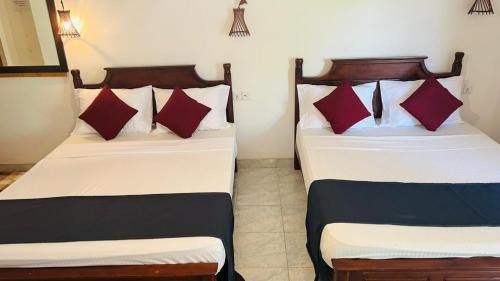Cama o camas de una habitación en Ella Sun Inn
