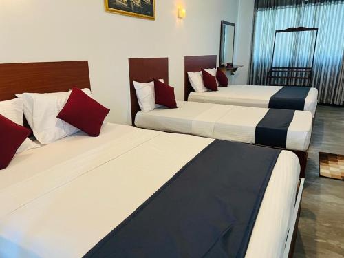 Cama o camas de una habitación en Ella Sun Inn