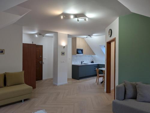 Posezení v ubytování Apartmany u Denyho
