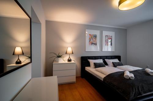 Letto o letti in una camera di SmartApartment Spiegelsal Trnava, 200m City Center
