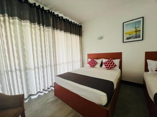Cama o camas de una habitación en Ella Sun Inn