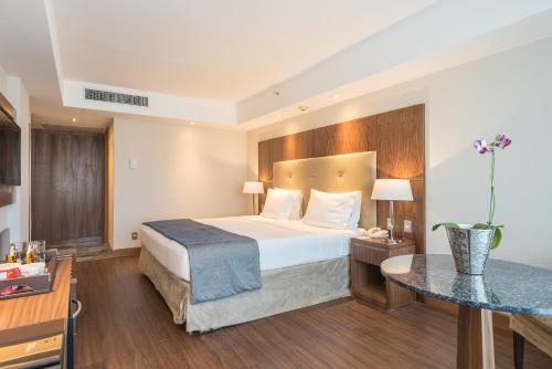 Katil atau katil-katil dalam bilik di Windsor Marapendi Hotel