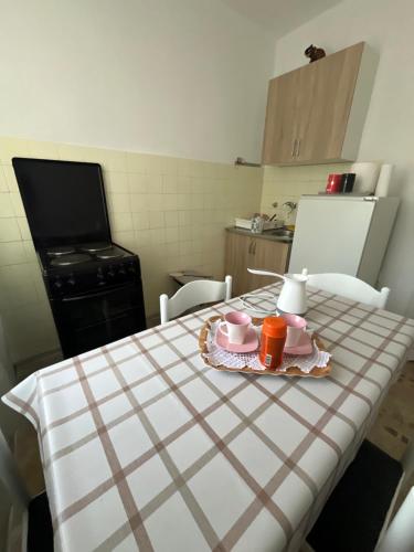 Kuchyň nebo kuchyňský kout v ubytování Lake City Apartment