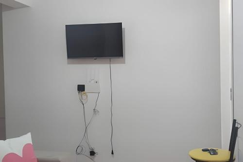 TV a/nebo společenská místnost v ubytování Apartamento do centro