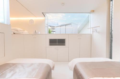 Cama o camas de una habitación en LOISIR Tateyama