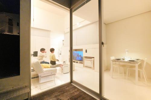 Una televisión o centro de entretenimiento en LOISIR Tateyama