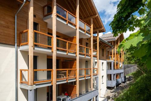 a building under construction with wooden beams at Appartement Neuf au pied Prorel in Briançon