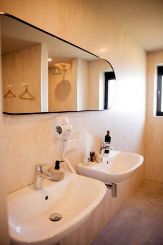Ένα μπάνιο στο Ecohome Jutter 8 and baby Zeezand Recreatie
