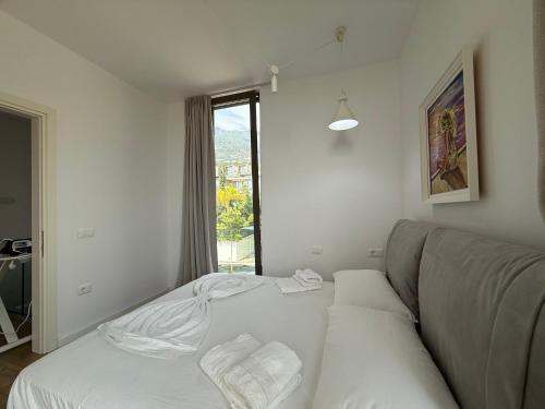 Katil atau katil-katil dalam bilik di Villa Olea Residence