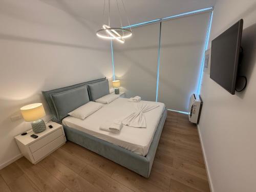 Katil atau katil-katil dalam bilik di Villa Olea Residence