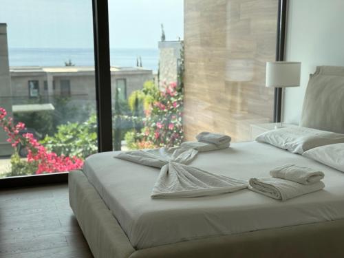 Katil atau katil-katil dalam bilik di Villa Olea Residence