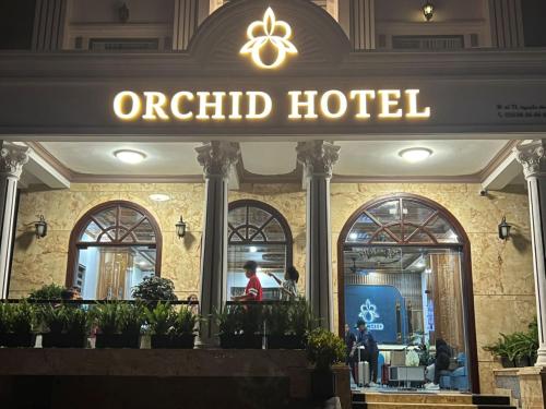 a hotel with a sign that reads orbit hotel at ORCHID Hotel in Da Lat