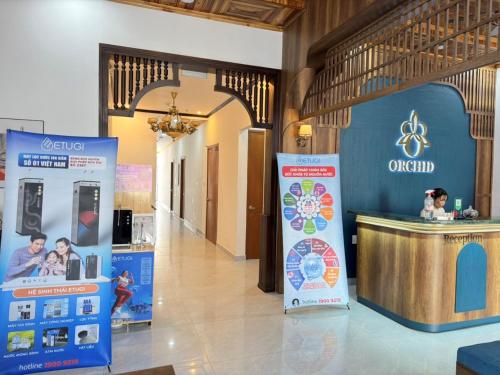 a lobby with a store with a counter in it at ORCHID Hotel in Da Lat