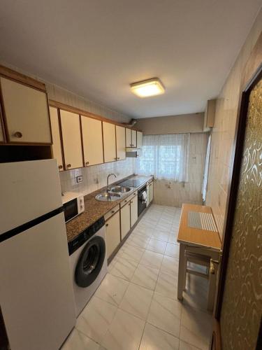 Kuchyň nebo kuchyňský kout v ubytování Miño Center Home