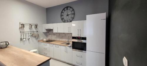 Η κουζίνα ή μικρή κουζίνα στο Apartament Magnolia
