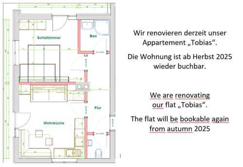 a floor plan and a diagram of a bathroom at Ferienwohnungen Annelies in Tux