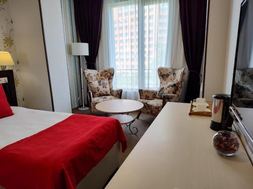East Gate Boutique Hotelにあるベッド