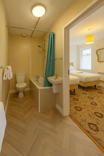 Koupelna v ubytování The Amara Inn