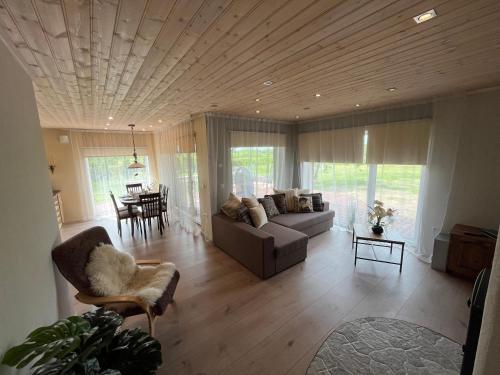 a living room with a couch and a table at Õuna 