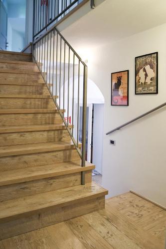 a staircase in a house with wooden floors at Casabella Lake in Castelletto sopra Ticino