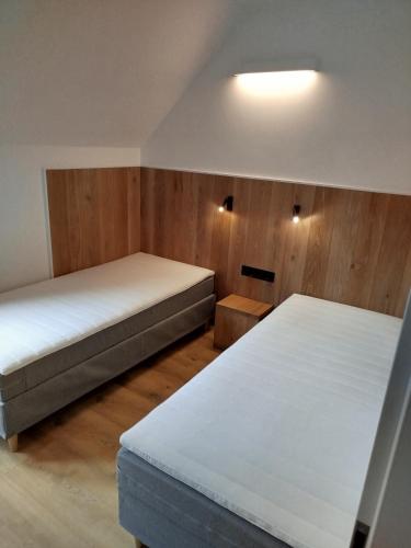 Postel nebo postele na pokoji v ubytování Apartament Hallo Sielpia
