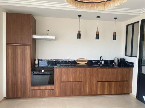 Køkken eller tekøkken på Appartement Vue mer La Baule