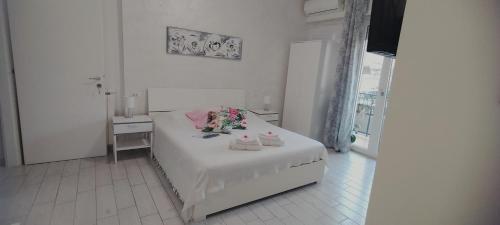 Postel nebo postele na pokoji v ubytování B&B La Palmetta