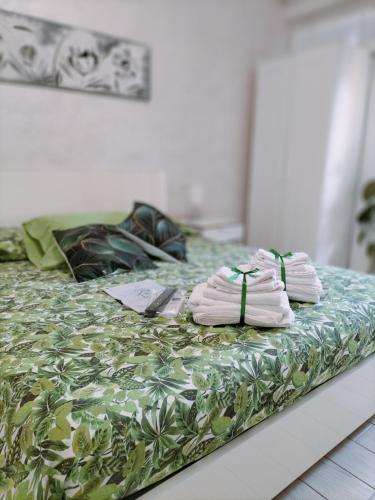 Postel nebo postele na pokoji v ubytování B&B La Palmetta