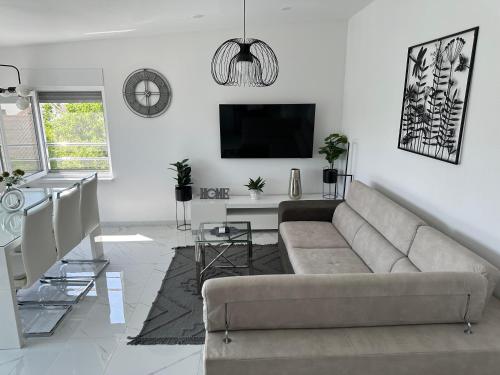 Kuchyň nebo kuchyňský kout v ubytování Apartman Garden Vodice