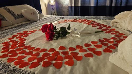 Postel nebo postele na pokoji v ubytování L Escale Spa Privatif