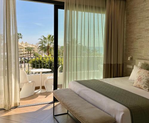 Posteľ alebo postele v izbe v ubytovaní Comfy Studios Hotel