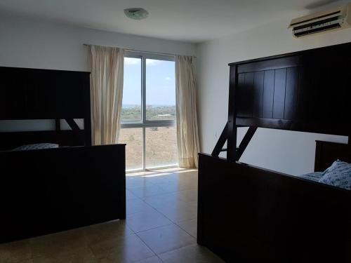 Lova arba lovos apgyvendinimo įstaigoje Beach Apartment