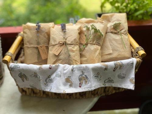 a basket filled with napkins on a table at Organska Farma Nebesa in Vrmdža