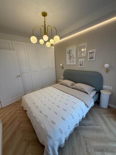 Letto o letti in una camera di Sunny apartment- Parko rezidencija SELF CHECK-IN