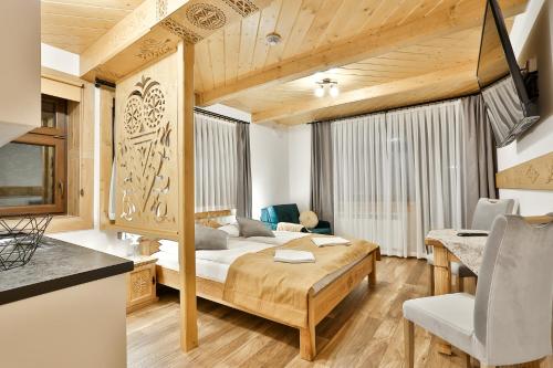 Posteľ alebo postele v izbe v ubytovaní Najlepszy Widok apartamenty