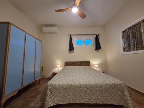 Ένα ή περισσότερα κρεβάτια σε δωμάτιο στο Overstay Pelion