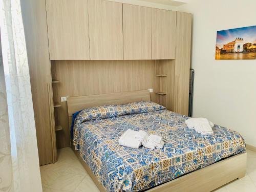 Postel nebo postele na pokoji v ubytování Campofelice Happy Casa