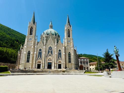 a large cathedral with two towers on top of it at Anna&Franco Guest House in Isernia