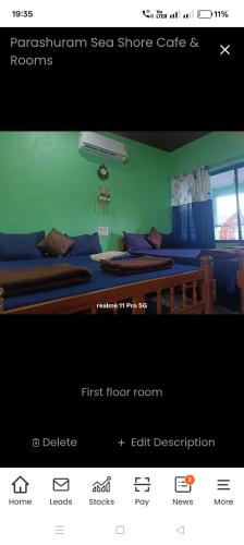 a page of a bed room with a first floor room at Srujana Beach Homestay in Gokarn