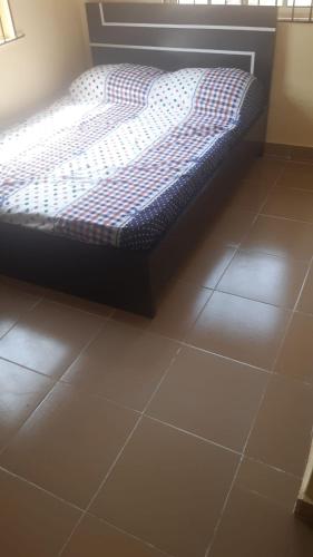 Llit o llits en una habitació de Home from home