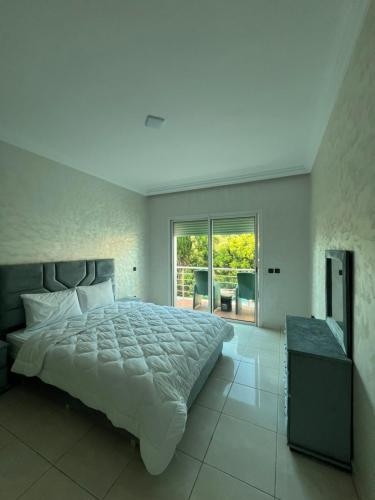 Ένα ή περισσότερα κρεβάτια σε δωμάτιο στο Oceanbreeze Villa Achakar