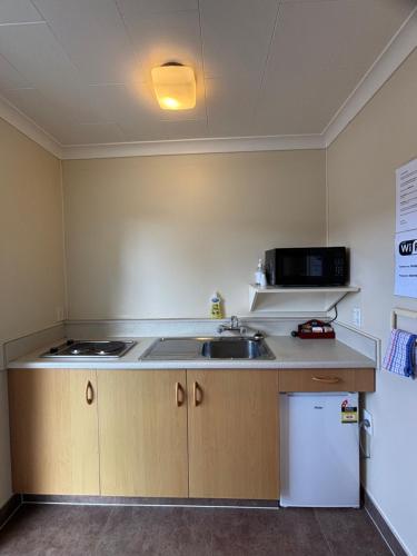 Dapur atau dapur kecil di Alpenhorn Motel