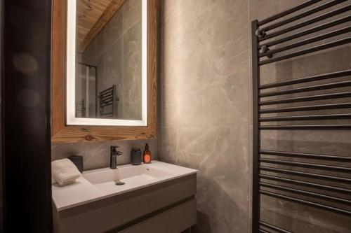 Phòng tắm tại Antarès Méribel Luxury Apartment