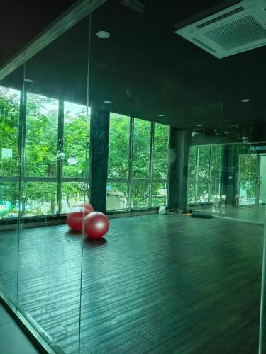 a room with red balls on the floor of a building at Peace home apex in Cyberjaya